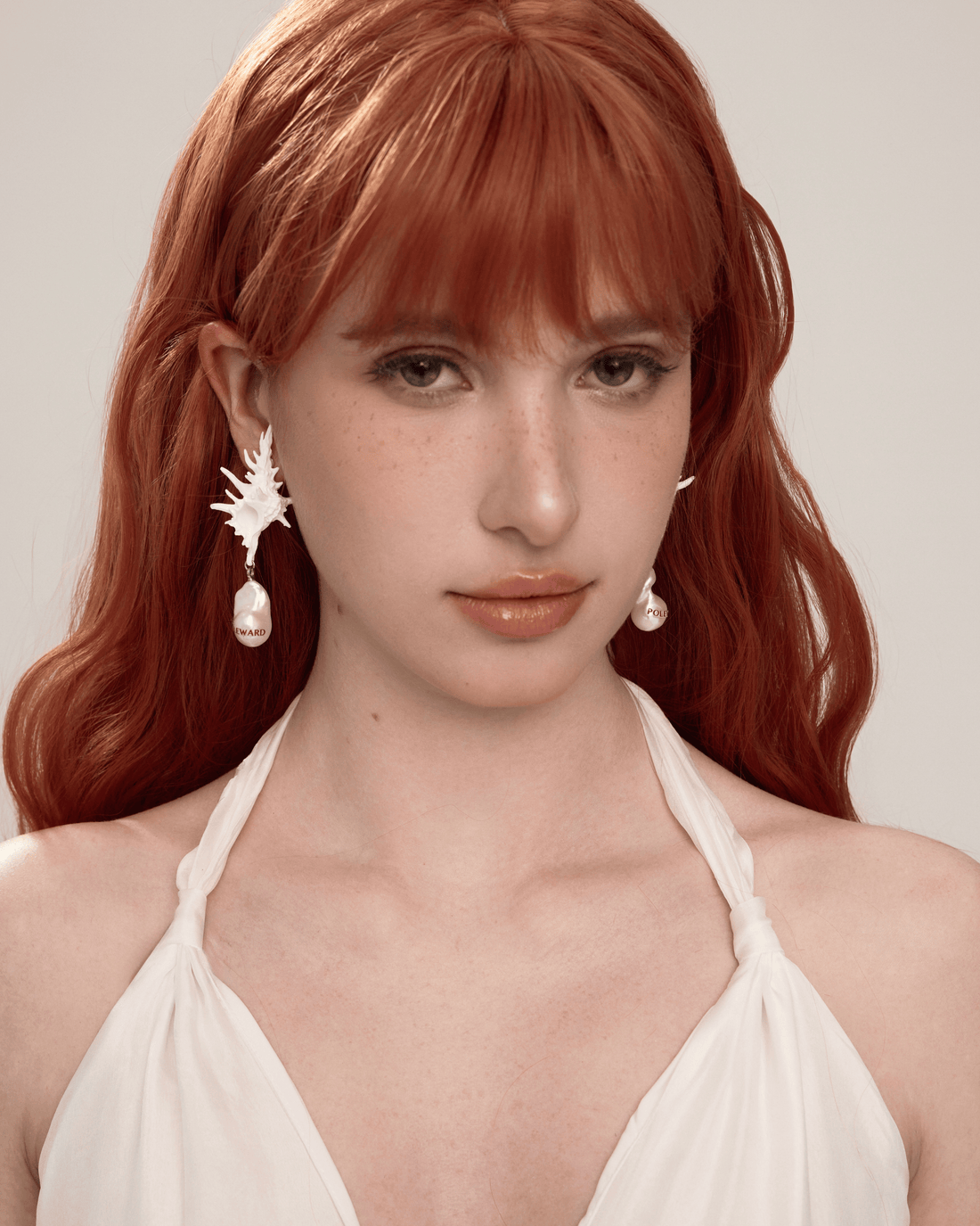 POLEWARD Oyster shell earrings
